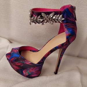 Women's size 7 heels with rhinestone ankle straps and zip closure